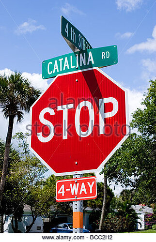 stop-sign-at-4-way-junction-in-cocoa-beach-florida-bcc2h2.jpg